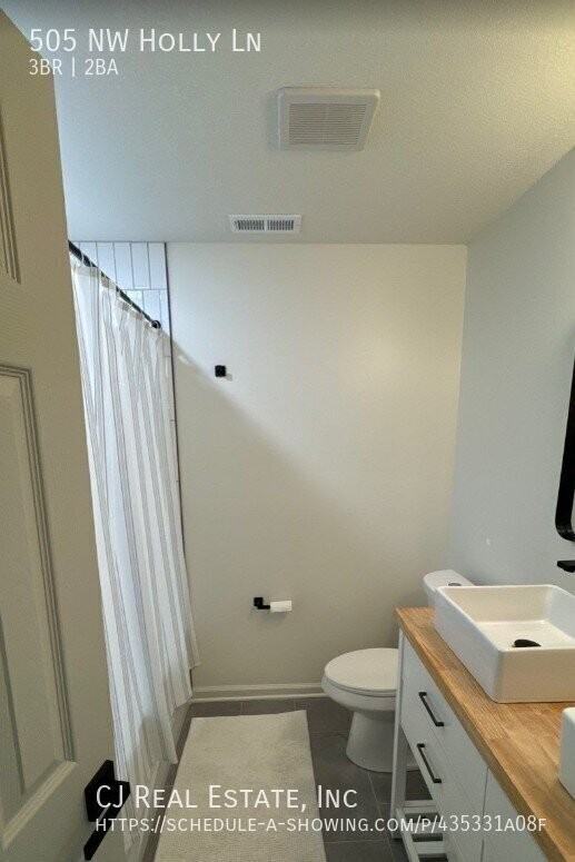505 Nw Holly Ln - Photo 5 of 10