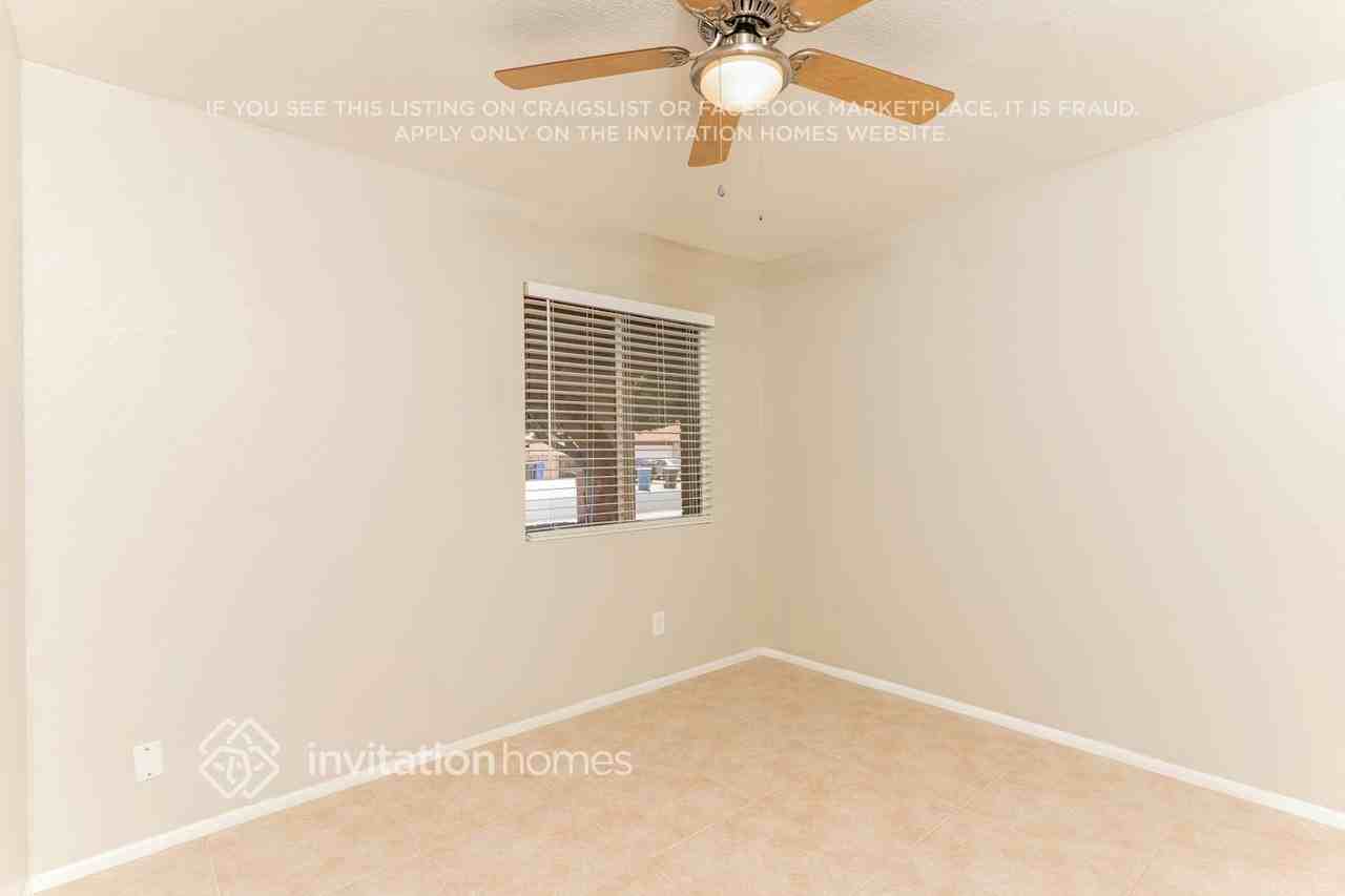12402 N 49th Ave - Photo 7 of 16
