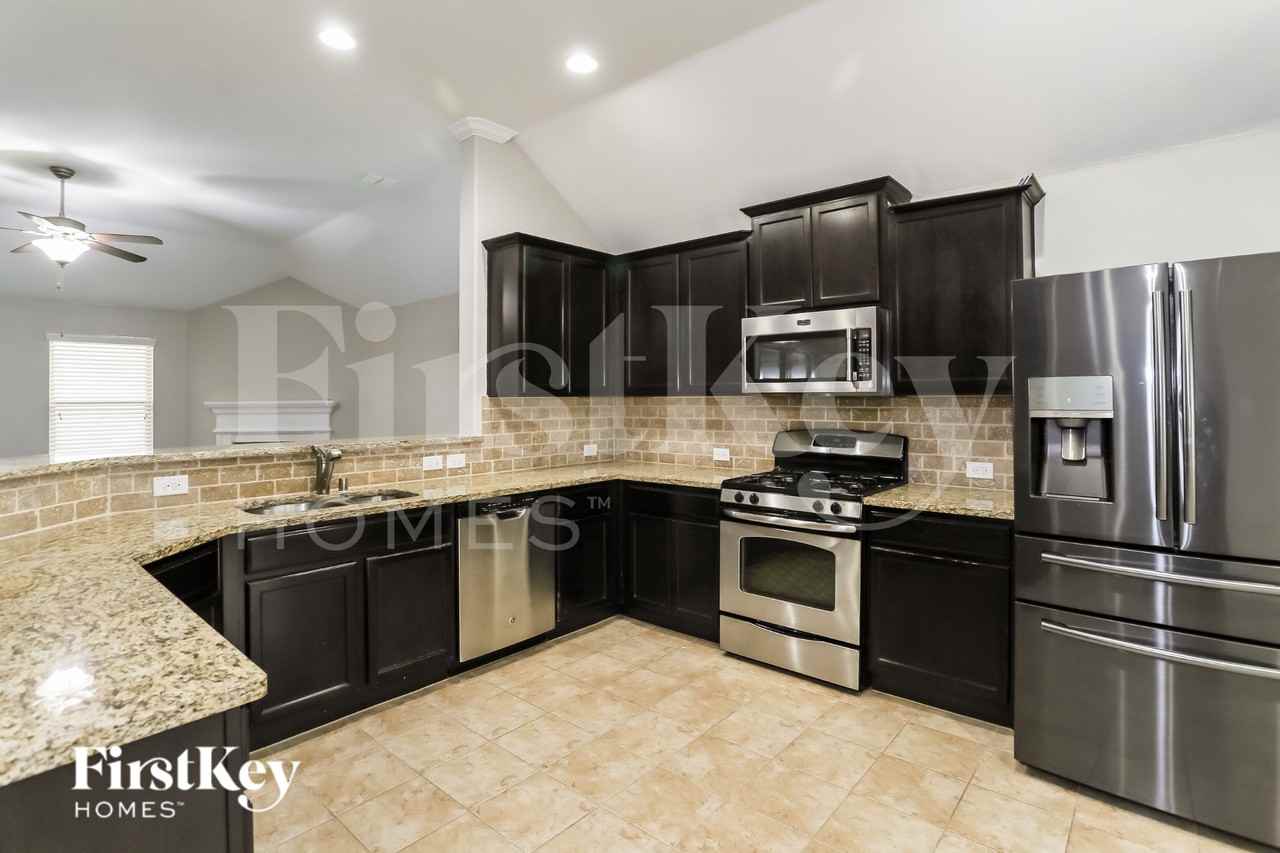 14312 Broomstick Rd - Photo 6 of 16