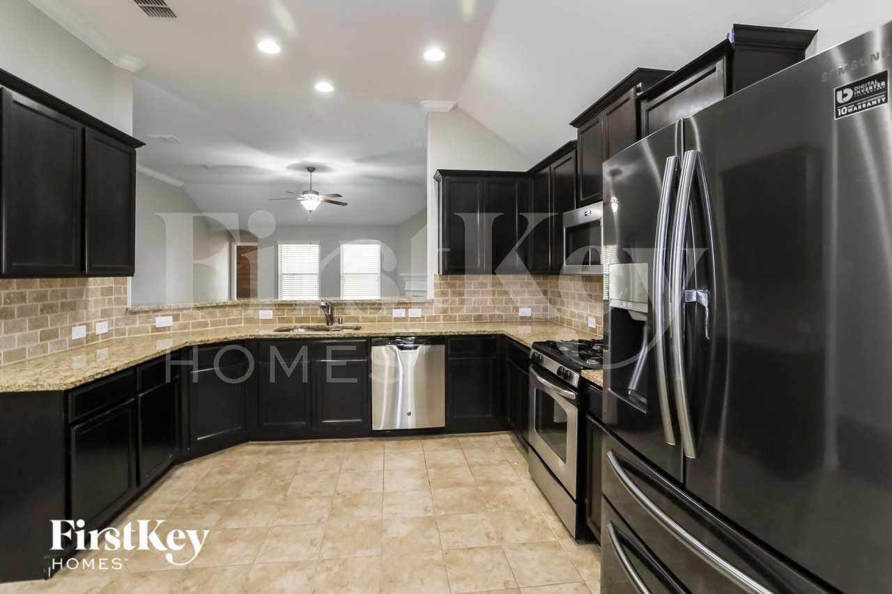 14312 Broomstick Rd - Photo 7 of 16