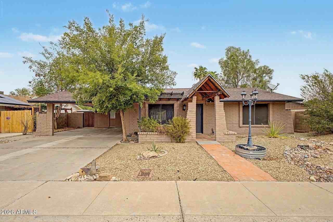 6616 W Aire Libre Ave - Photo 2 of 18