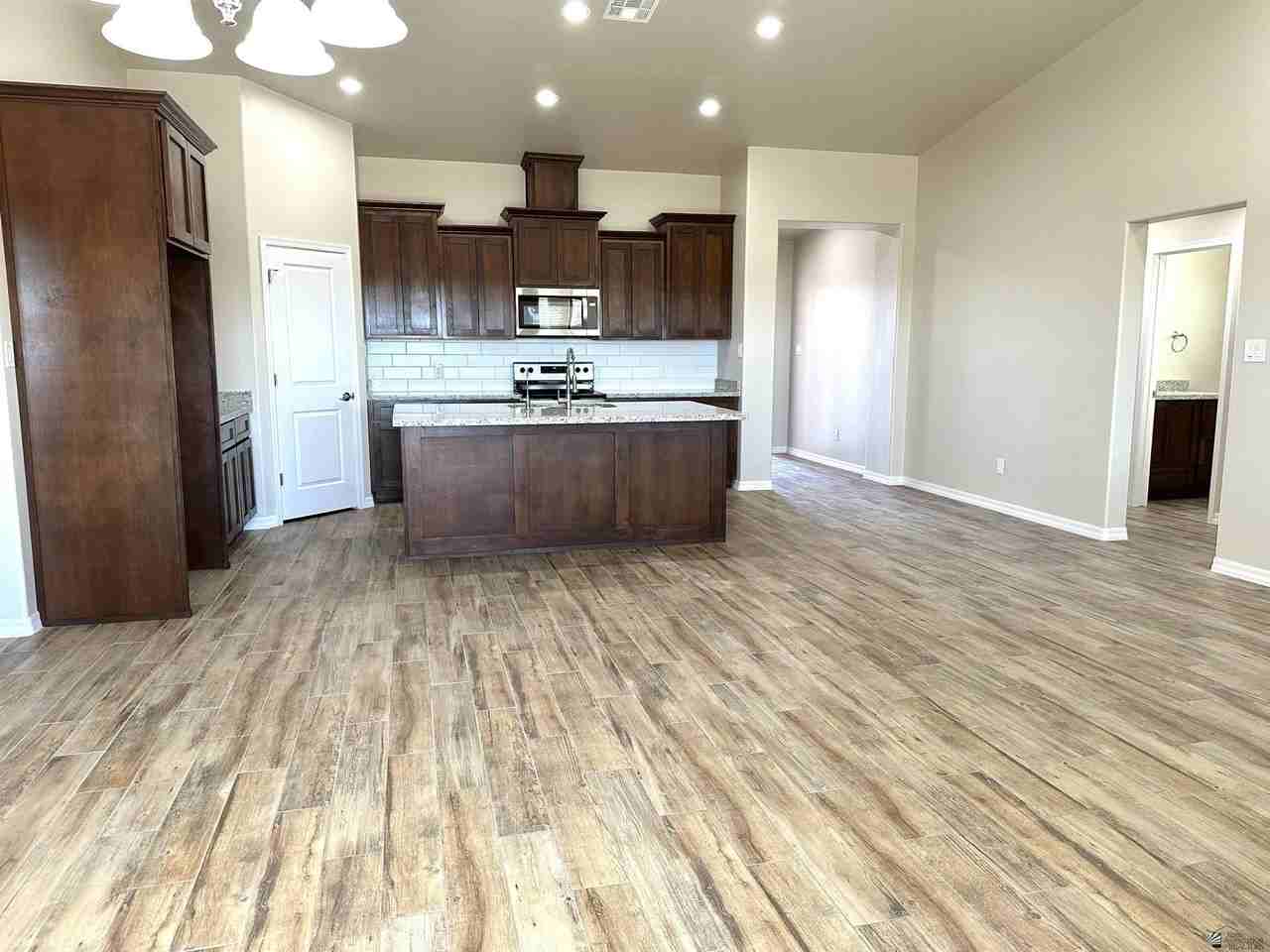 12623 E 50th Ln - Photo 4 of 15