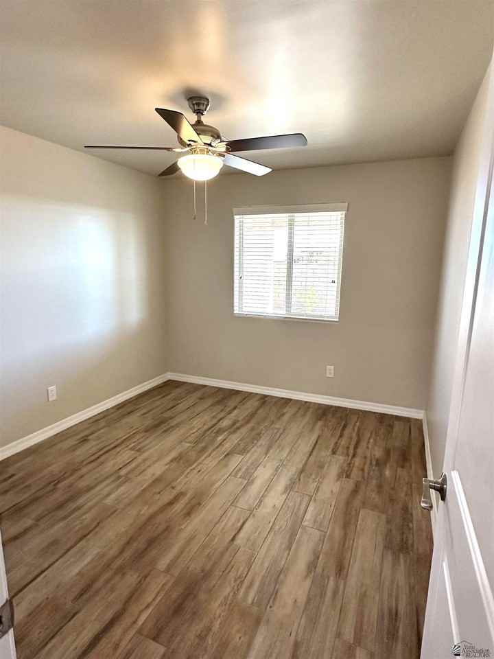 12623 E 50th Ln - Photo 6 of 15