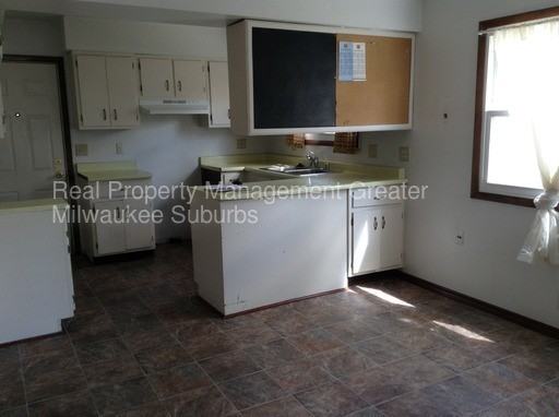 8316 W Crawford Ave - Photo 3 of 23