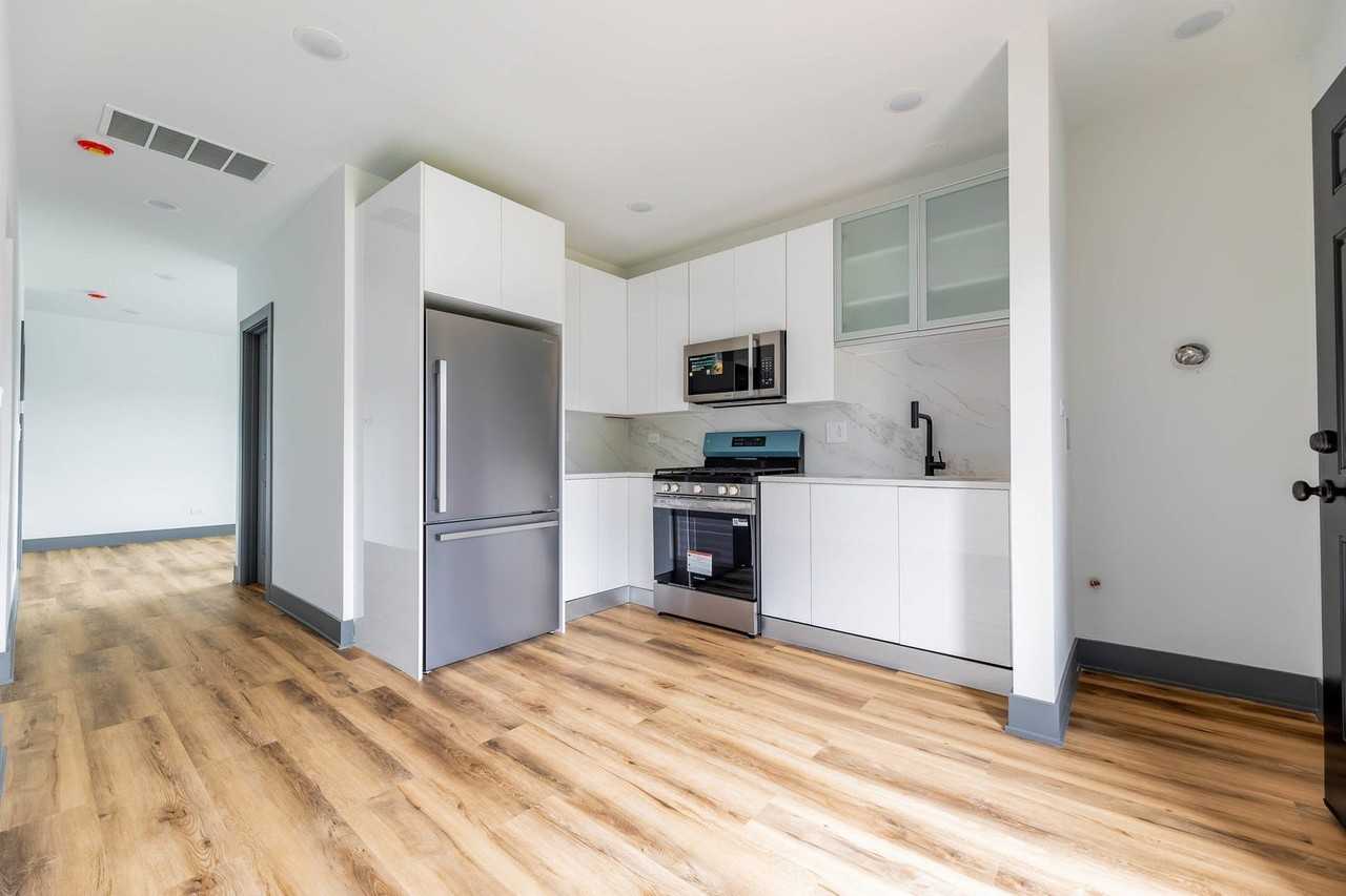 7642 S Throop St #2 - Photo 4 of 14