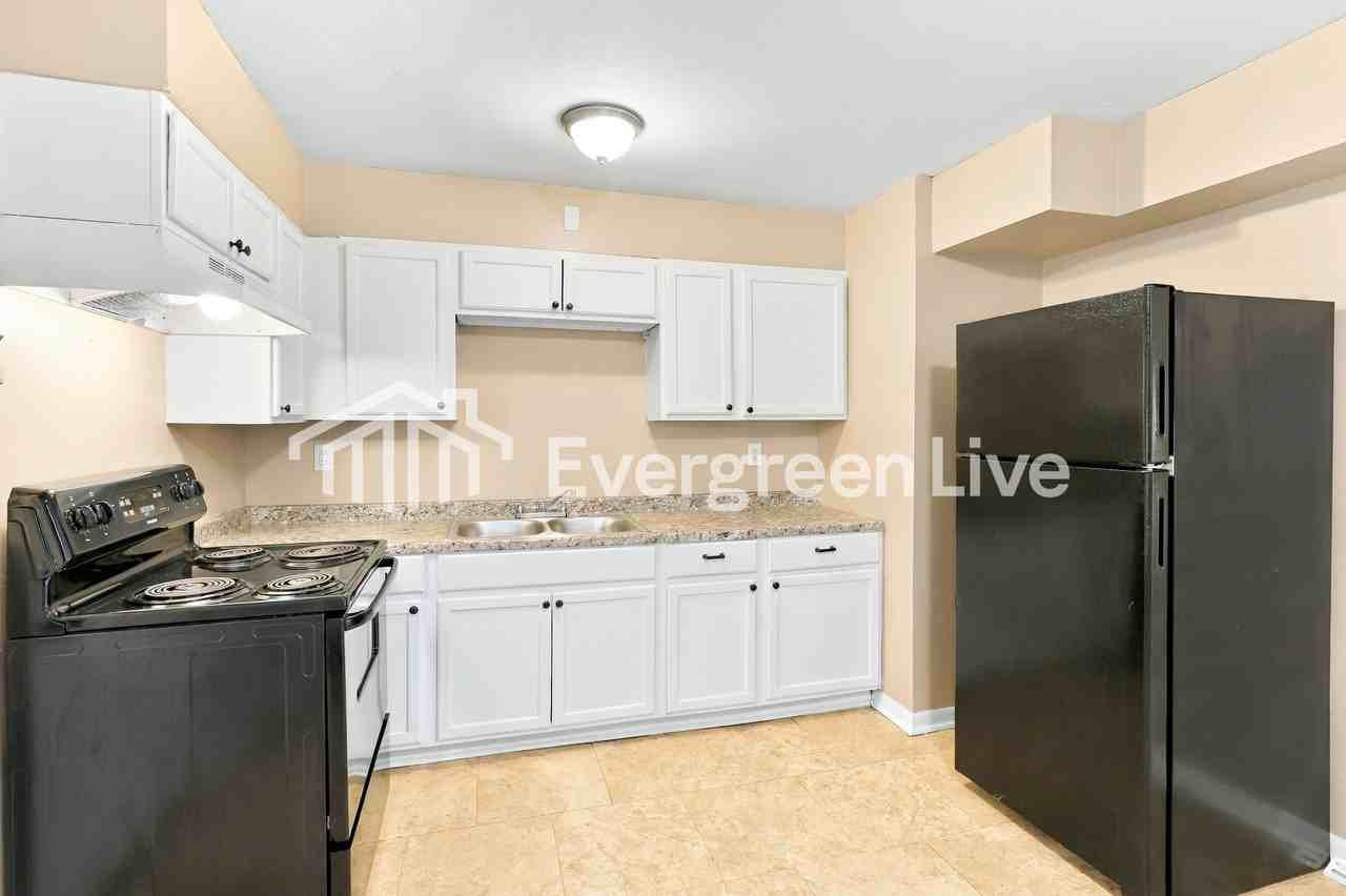 7704 E 108th Ter - Photo 5 of 15