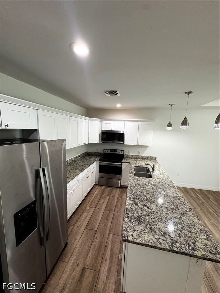 1104 Ichabod Ave - Photo 3 of 13