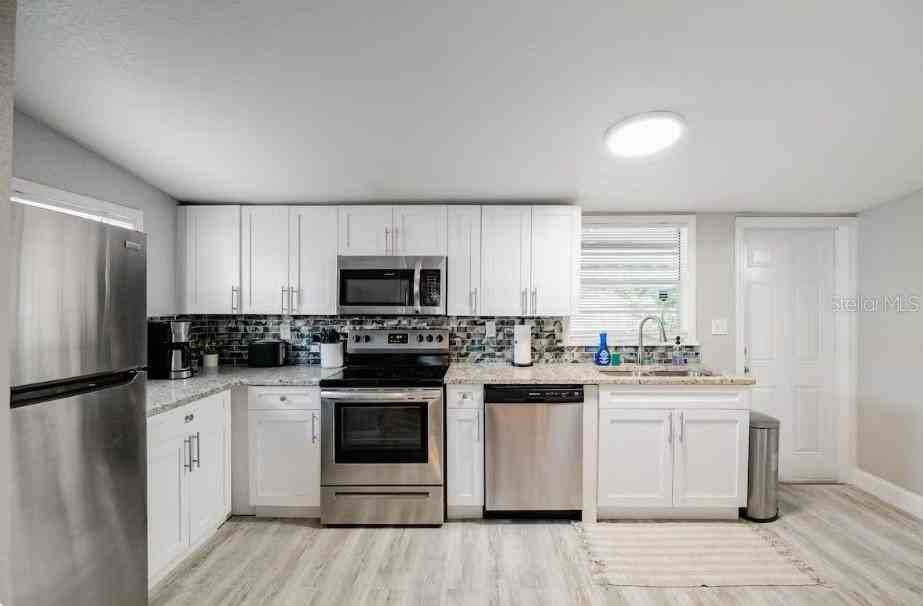 8311 N Newport Ave - Photo 5 of 13