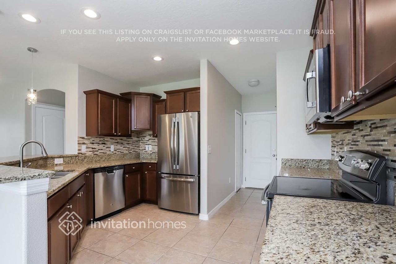 10015 Newminster Loop - Photo 4 of 16