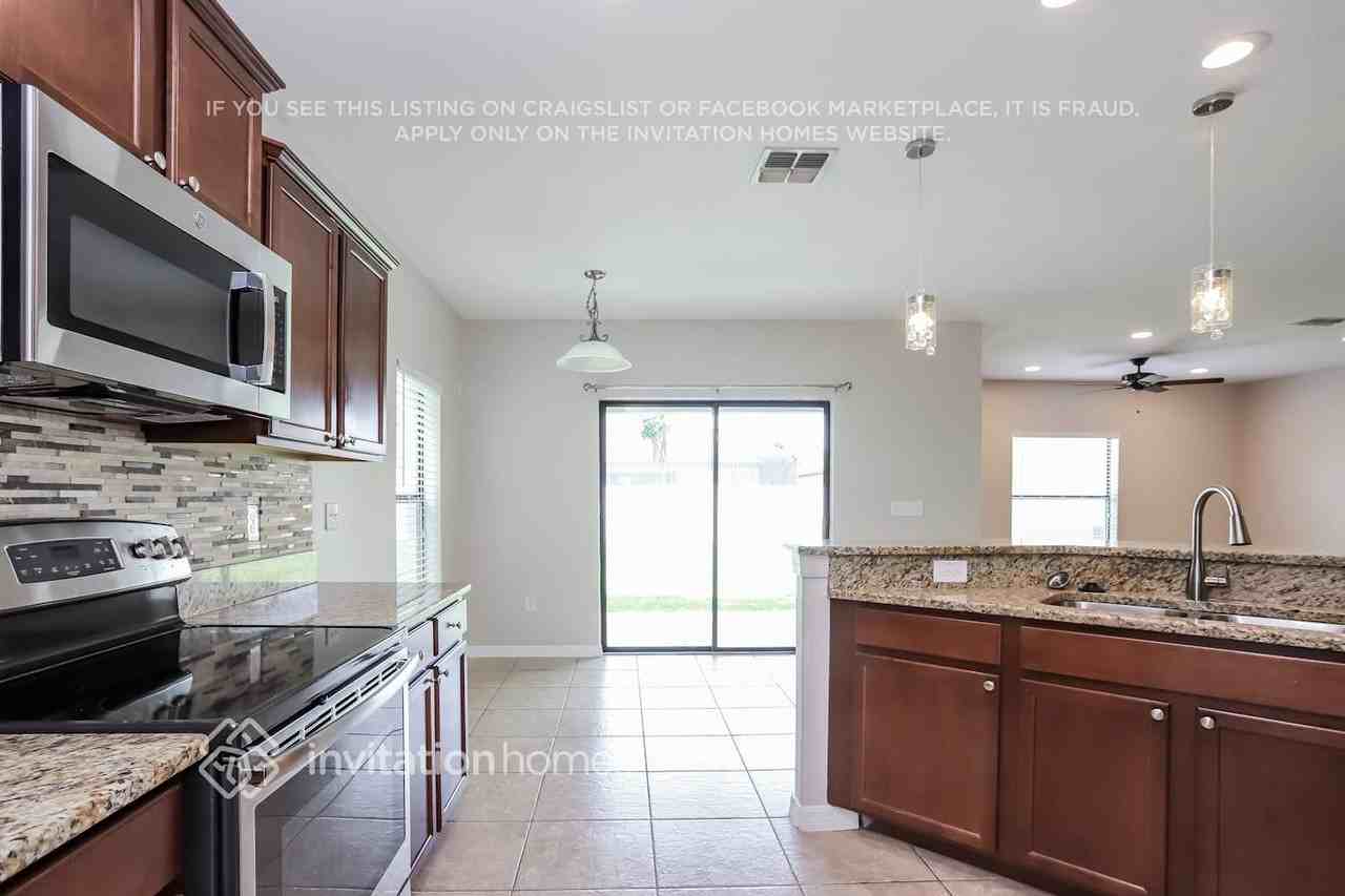 10015 Newminster Loop - Photo 5 of 16