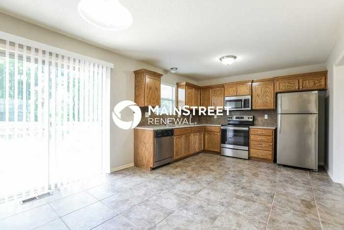 7213 E 165th St - Photo 5 of 17