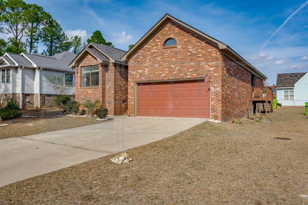 6 Huntcliff Ct - Photo 3 of 27