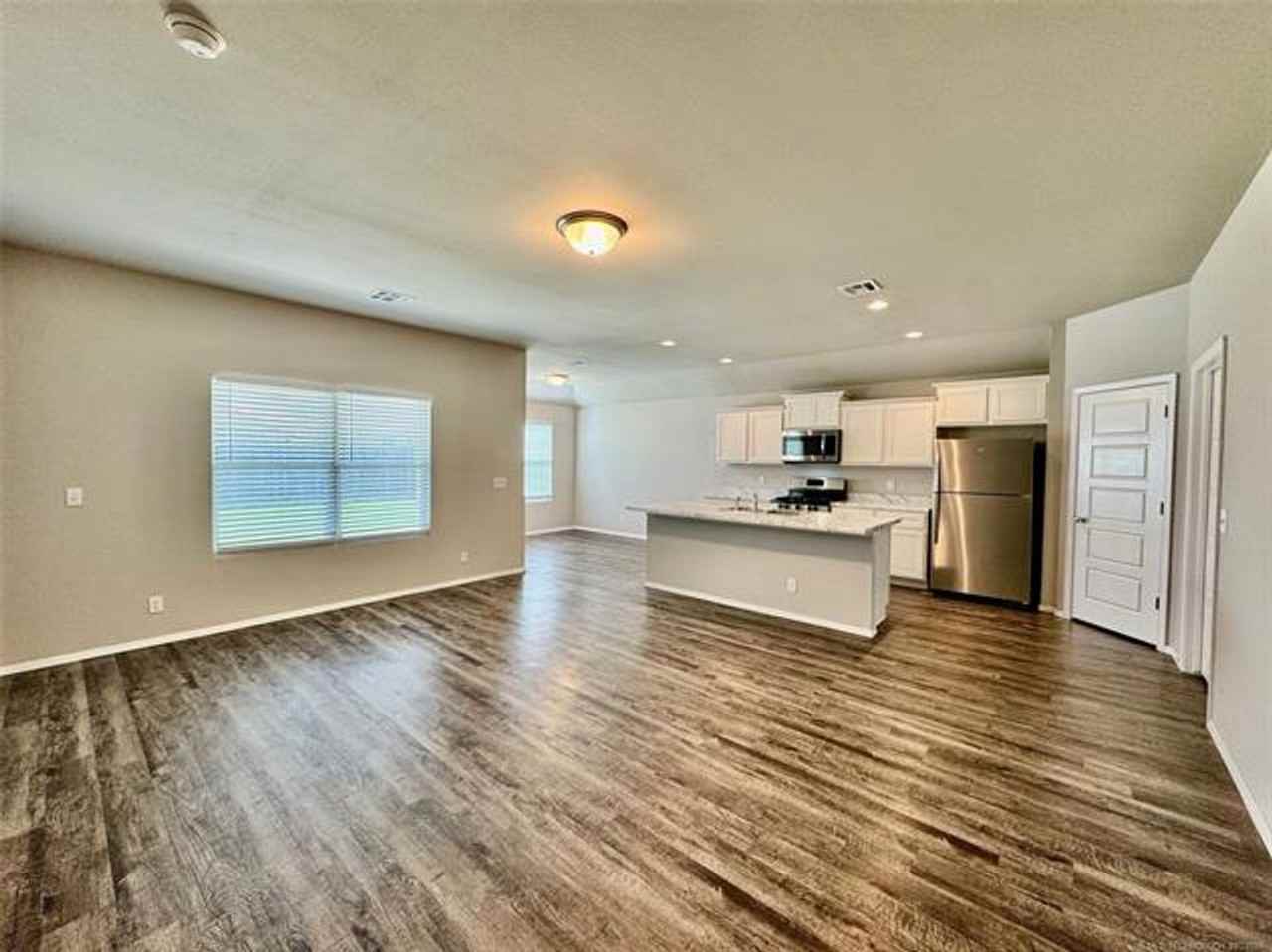 14116 N 74th East Ave - Photo 4 of 35