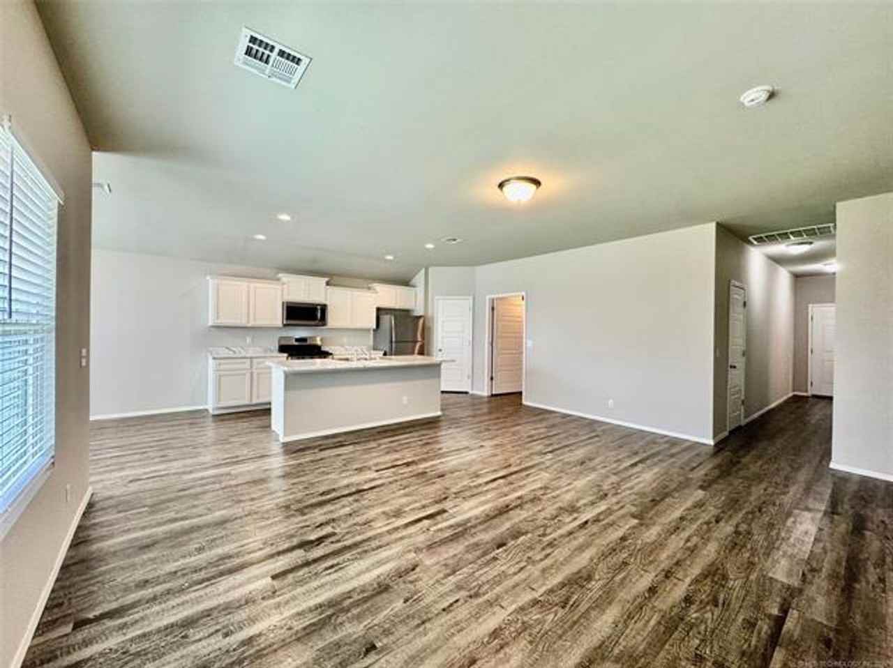 14116 N 74th East Ave - Photo 5 of 35