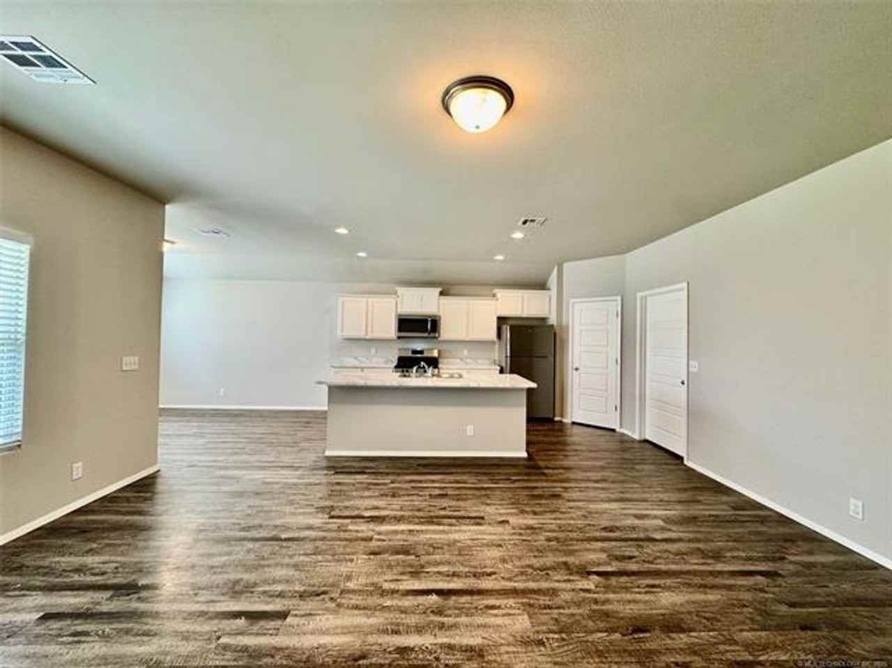 14116 N 74th East Ave - Photo 7 of 35