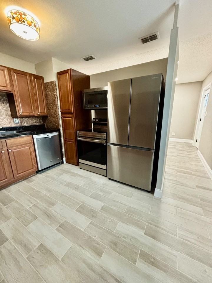 7727 Perugia Ave - Photo 3 of 16