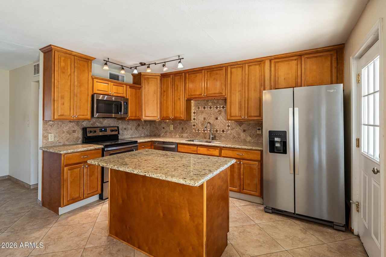 8303 E Glenrosa Ave - Photo 3 of 21