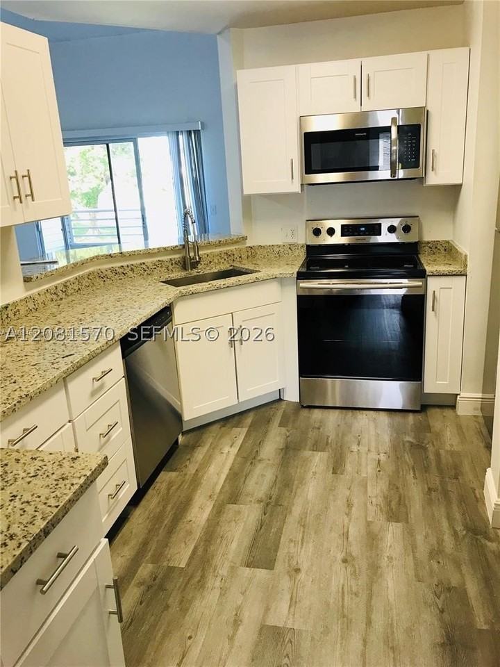 3437 Nw 44th St #204 - Photo 3 of 26