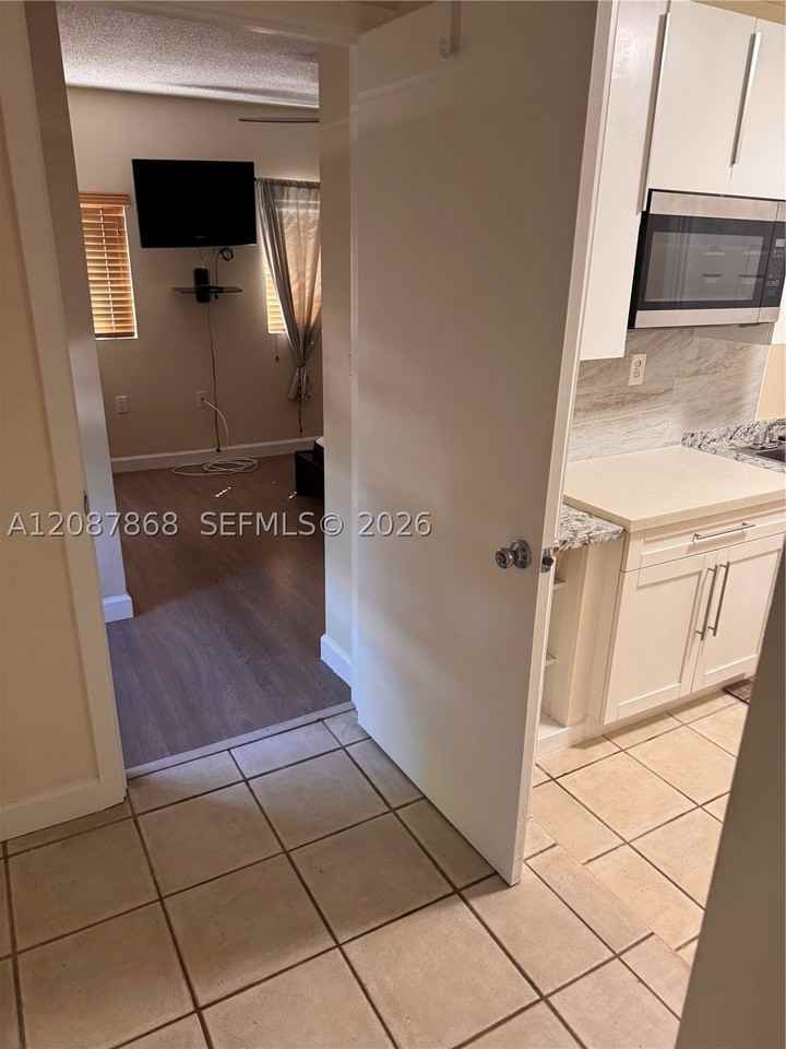 9900 W Calusa Club Dr #1 - Photo 2 of 11