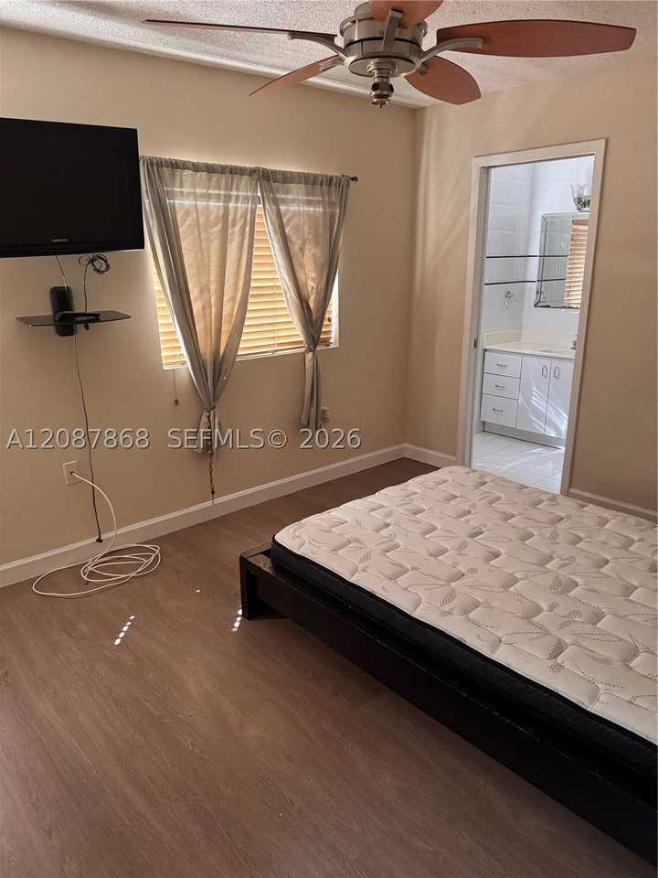 9900 W Calusa Club Dr #1 - Photo 5 of 11