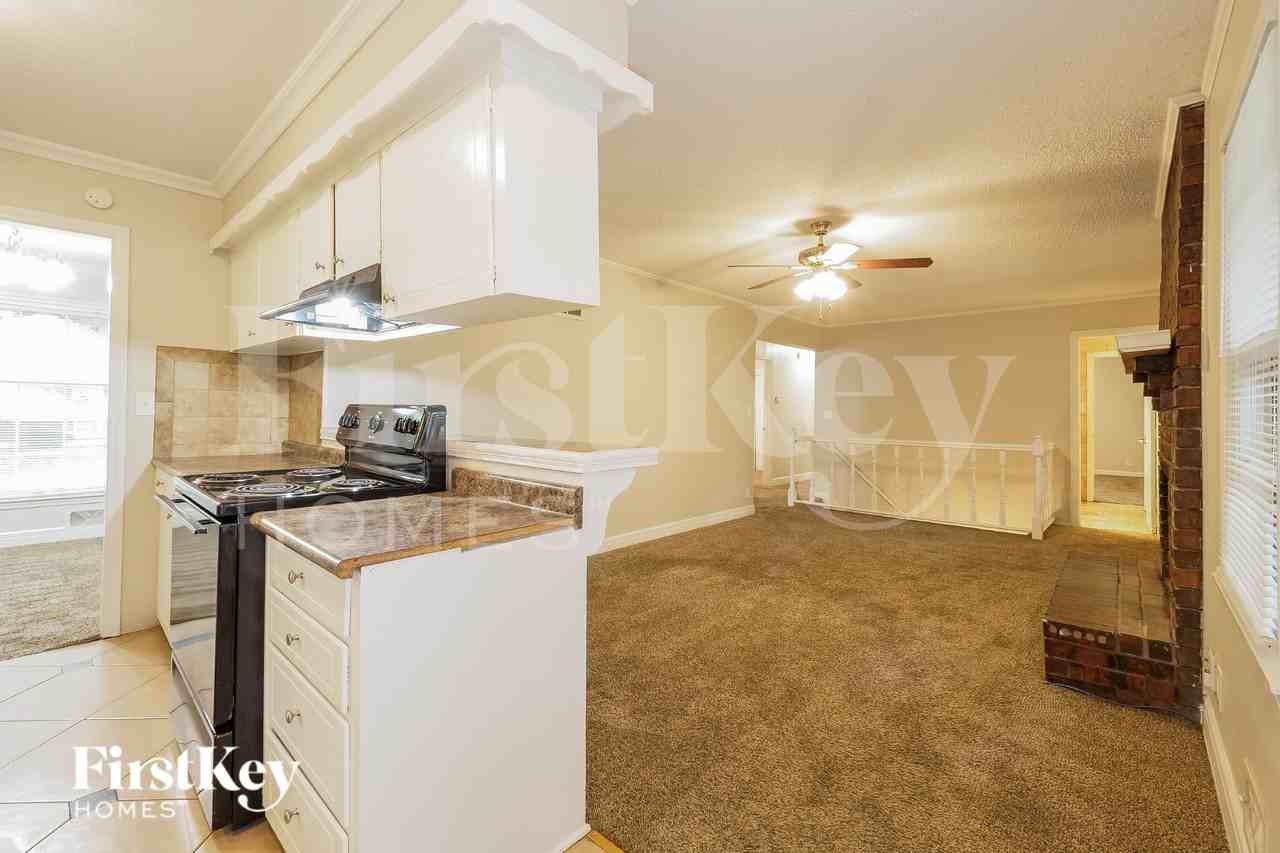 11901 E 56th Ter - Photo 3 of 15
