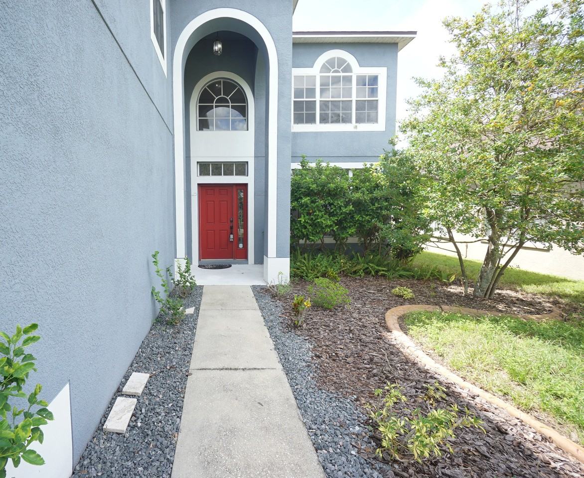 8718 Sandy Plains Dr - Photo 2 of 28