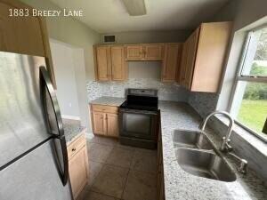 1883 Breezy Ln - Photo 2 of 15