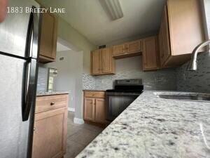 1883 Breezy Ln - Photo 3 of 15
