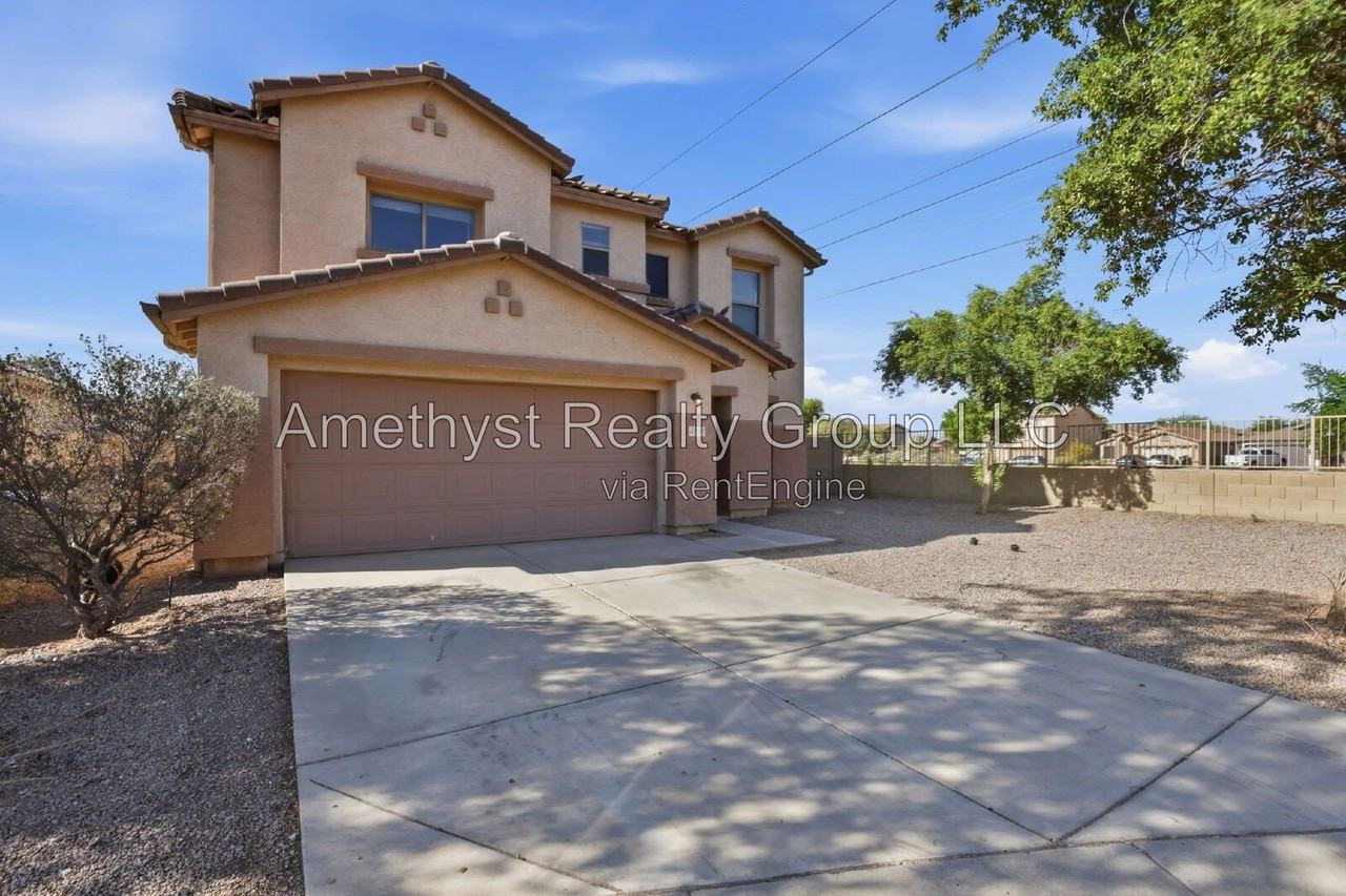 5931 W Albeniz Pl - Photo 2 of 37