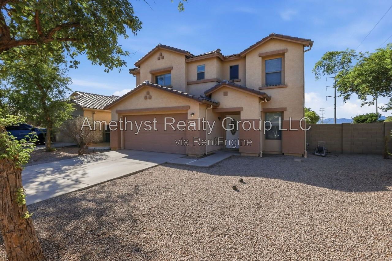 5931 W Albeniz Pl - Photo 3 of 37