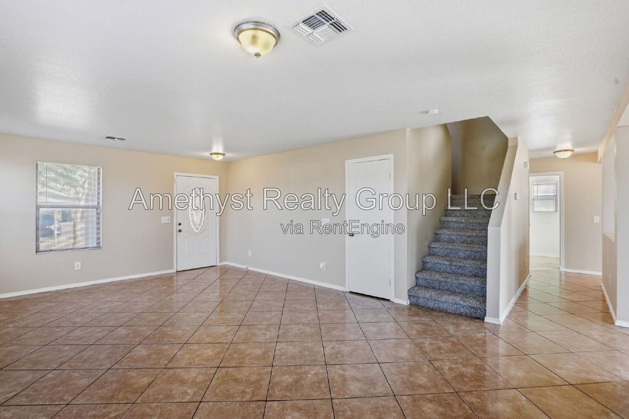 5931 W Albeniz Pl - Photo 5 of 37