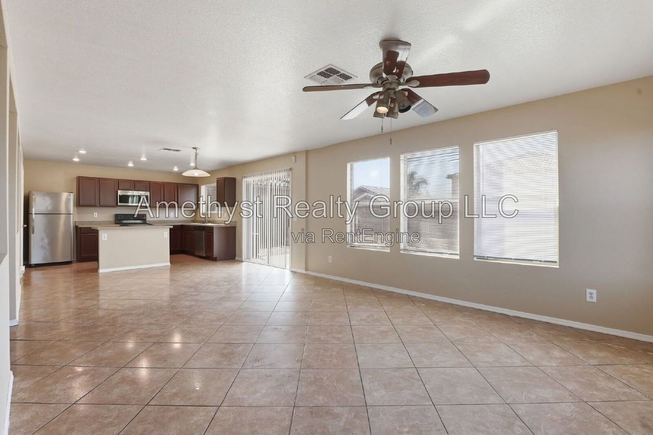 5931 W Albeniz Pl - Photo 6 of 37