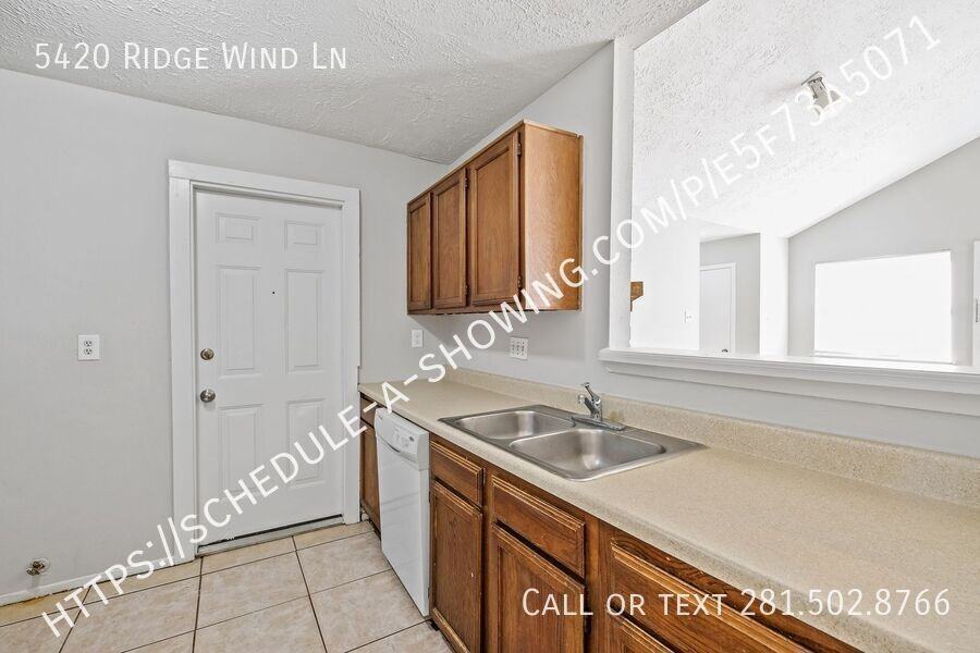 5420 Ridge Wind Ln - Photo 3 of 12