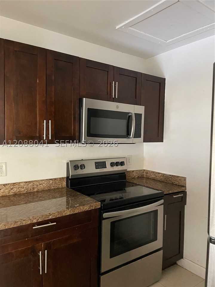 15318 Sunset Dr #15-21 - Photo 3 of 7