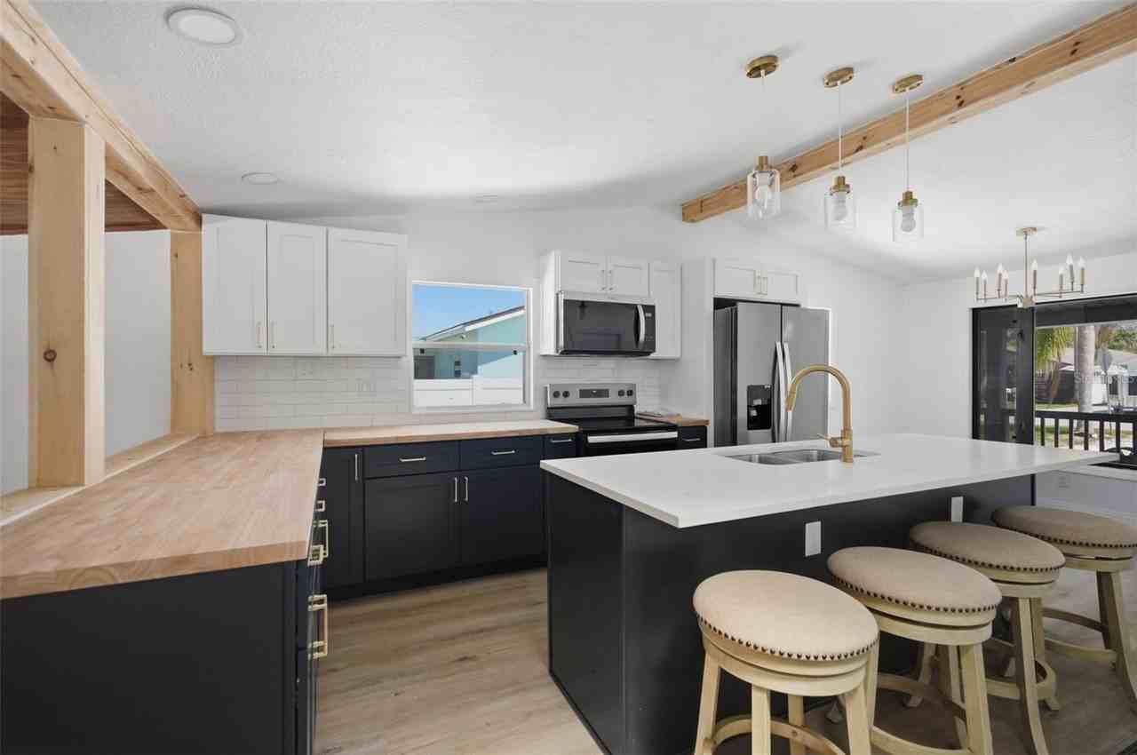 7037 Mccray Dr - Photo 4 of 31