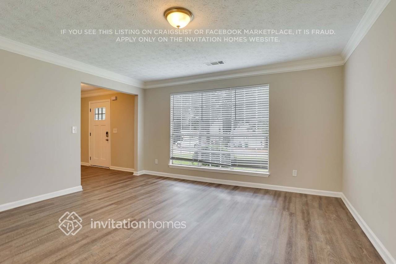 6574 Eastbriar Dr - Photo 3 of 25