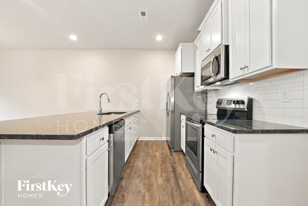 10728 Rivergate Dr Nw - Photo 6 of 16
