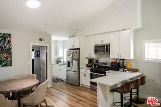1154 N Ogden Dr - Photo 2 of 8