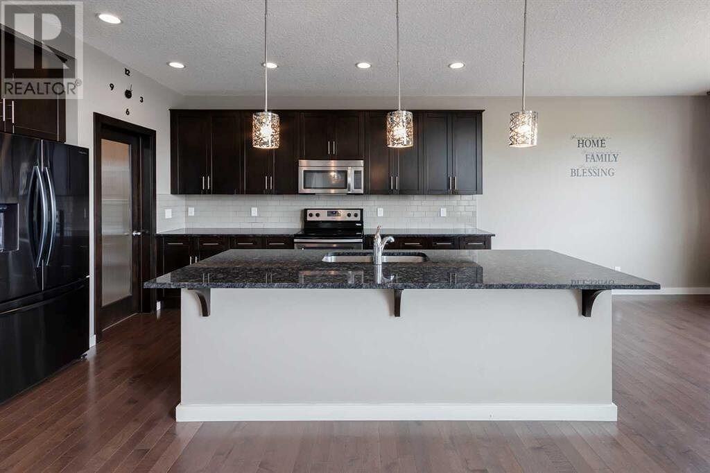 209 Kingsmere Cove Se - Photo 4 of 14
