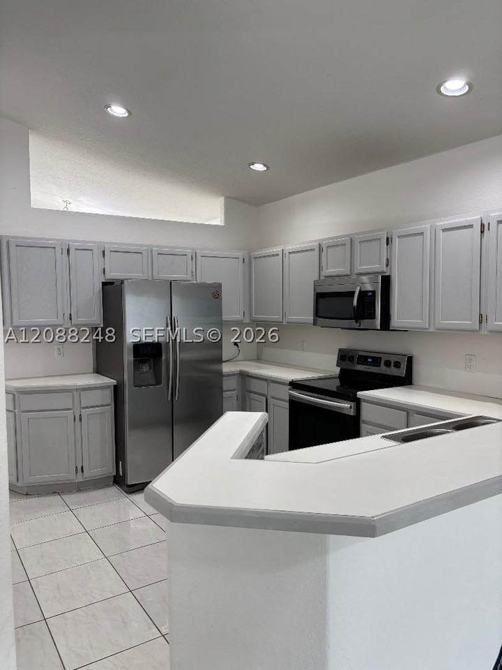 8995 Nw 148th St #8995 - Photo 4 of 41
