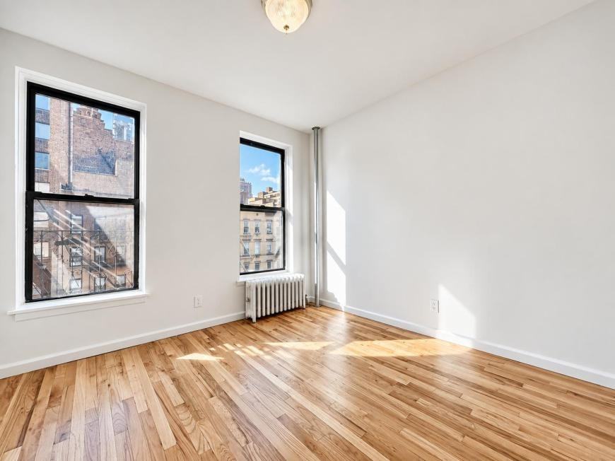 401 E 68th St - Photo 4 of 9