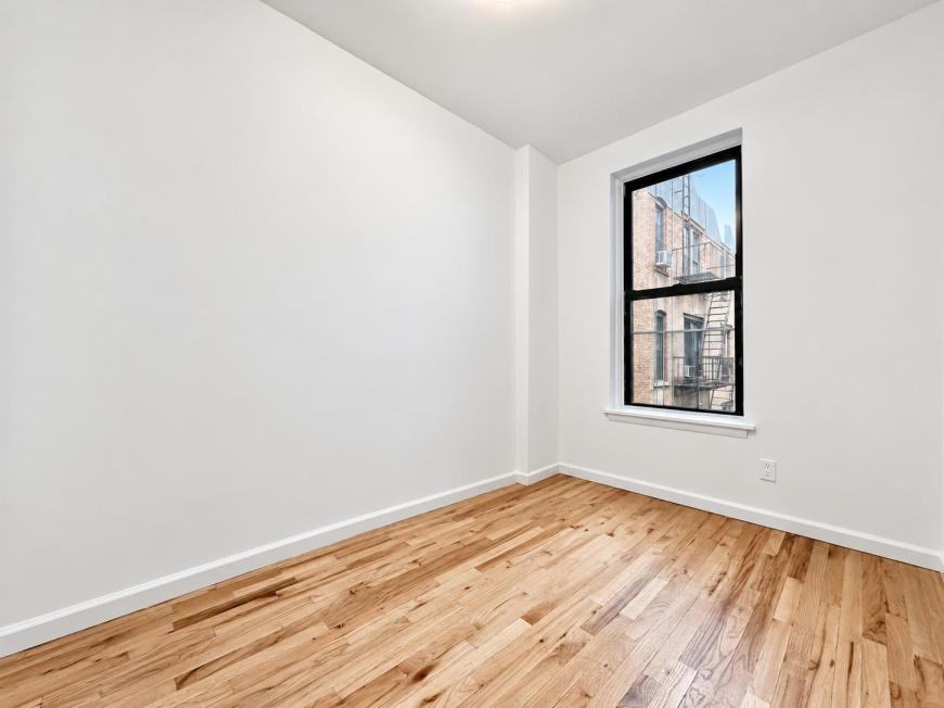 401 E 68th St - Photo 5 of 9