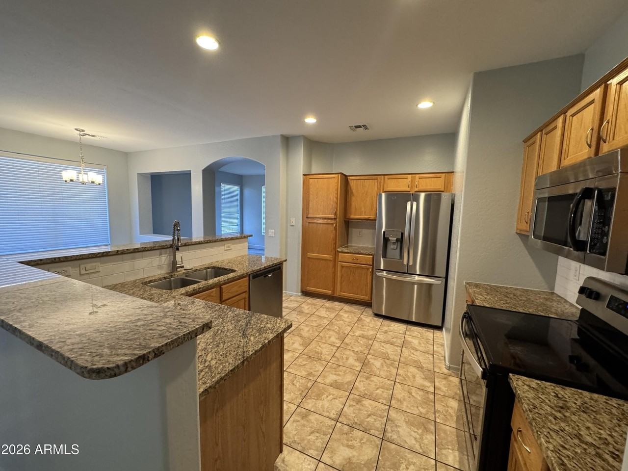 11562 W La Reata Ave - Photo 5 of 16