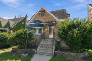 7117 W Armitage Ave - Photo 1 of 1