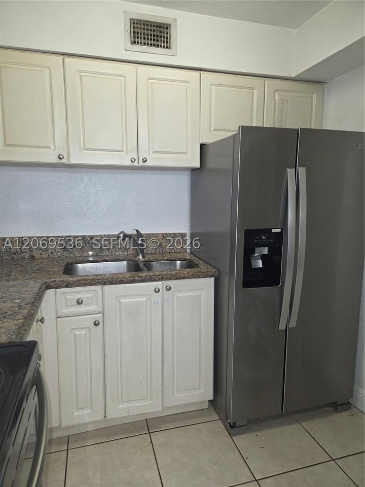 9445 Sw 76th St #U1 - Photo 2 of 13