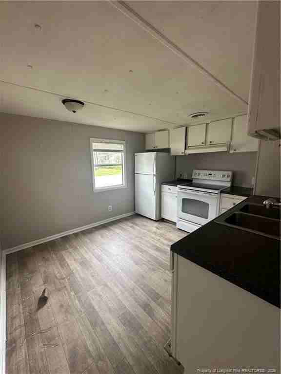 The Cottages MHP - Photo 3 of 4