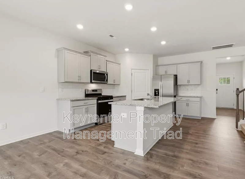 7448 Buckpasser Dr - Photo 3 of 49