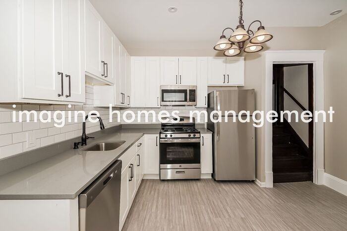 1410 Logan Ave N - Photo 6 of 16
