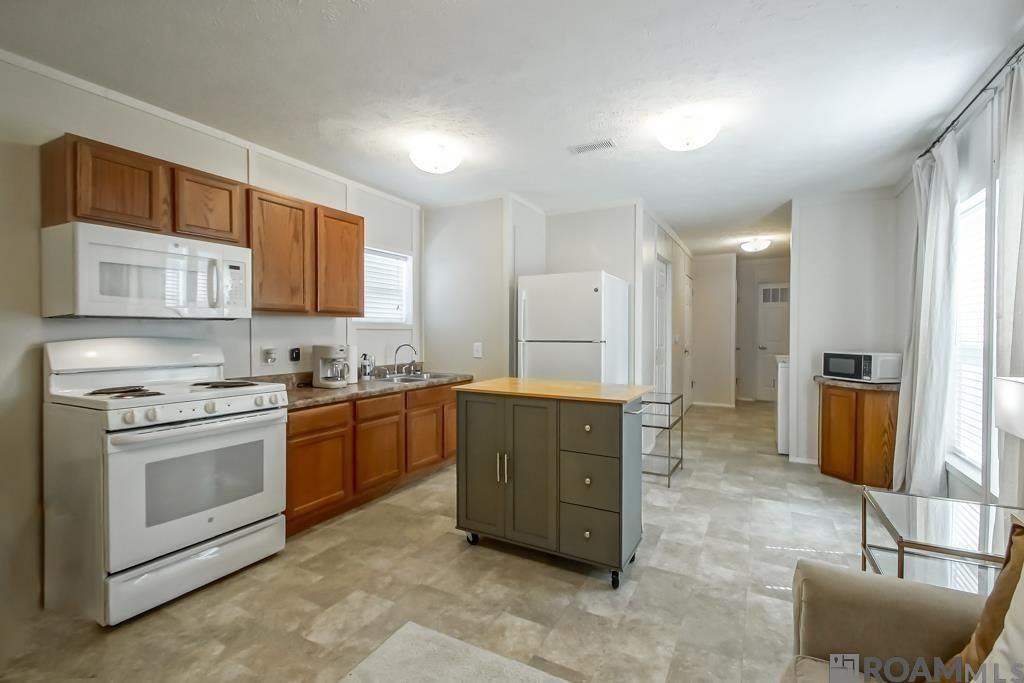 12938 Laws Ln - Photo 3 of 16