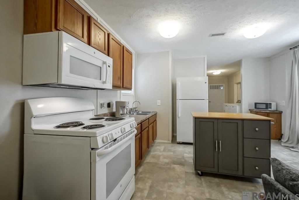12938 Laws Ln - Photo 4 of 16